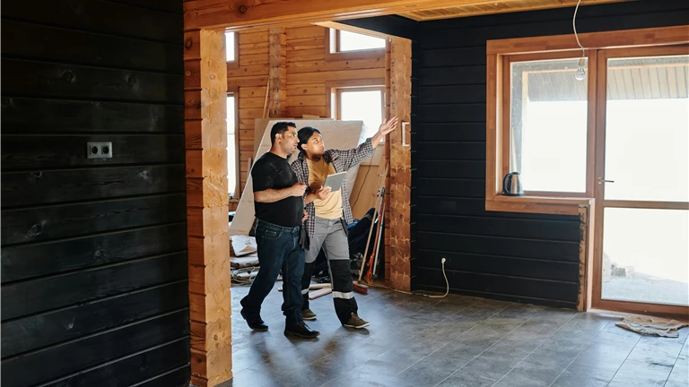 Two People Checking on a Construction Project